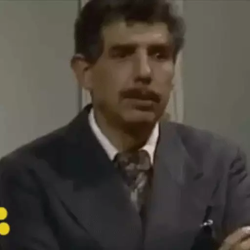 Figurinha: Homem de terno falando