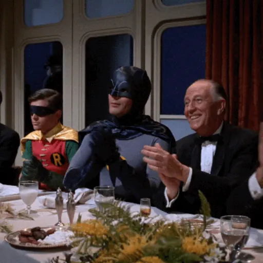 Figurinha: Batman e Robin aplaudindo