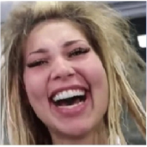 Figurinha: Mulher rindo com cabelo bagunçado