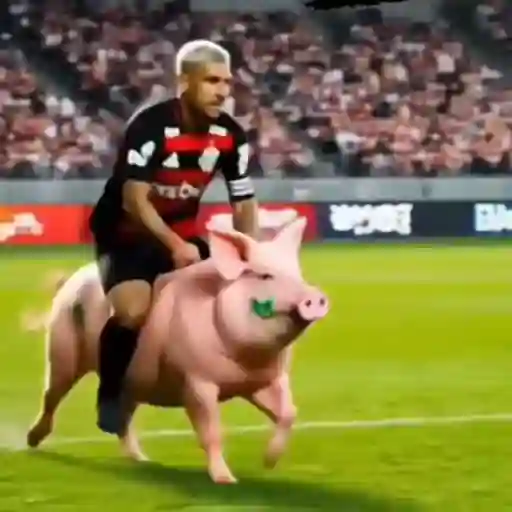Figurinha: Jogador de futebol montado em porco