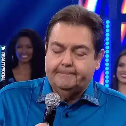 Figurinha: Faustão triste com microfone