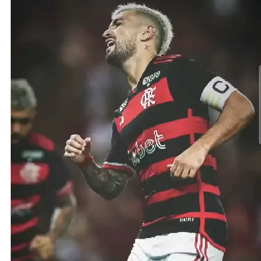 Figurinha: Jogador de futebol comemora