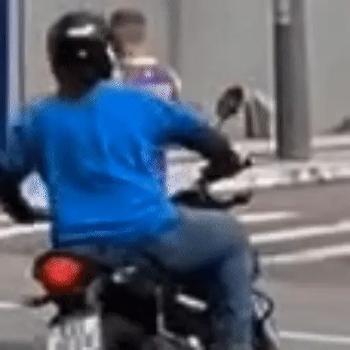 Figurinha: Ladrão de celular em moto