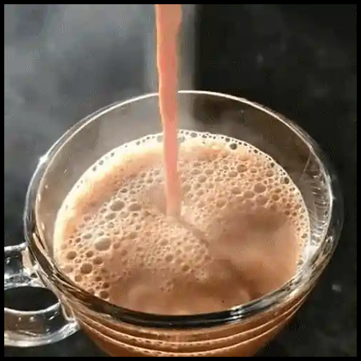 Figurinha: Café cremoso sendo servido