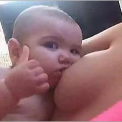 Figurinha: Bebê faz joinha amamentando
