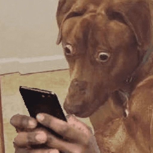 Figurinha: Cachorro em choque com o celular