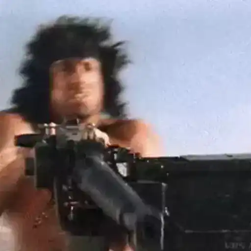 Sticker: Rambo firing a machine gun