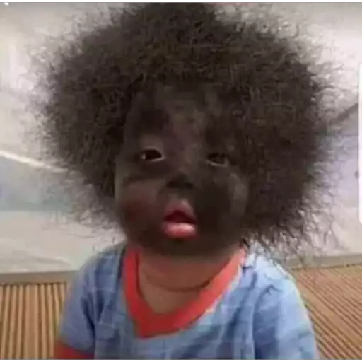 Figurinha: Bebê com cabelo afro e pele escura