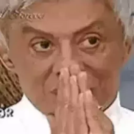 Figurinha: Clodovil rezando