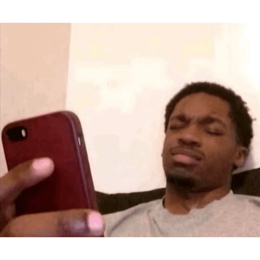 Figurinha: Confuso olhando o celular
