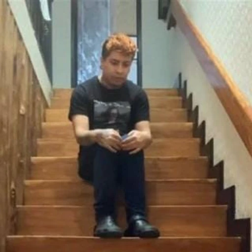 Sticker: Sad boy on stairs