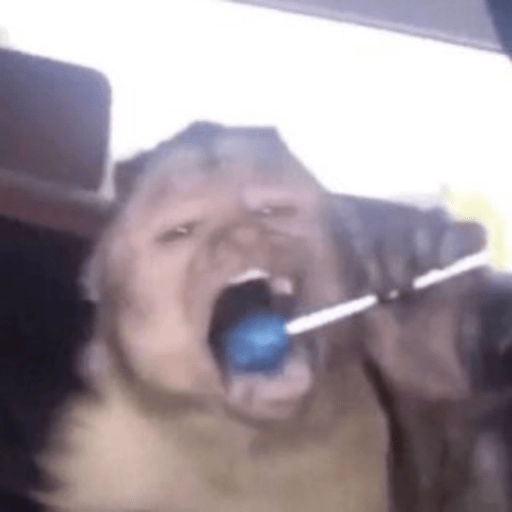 Figurinha: Macaco com pirulito
