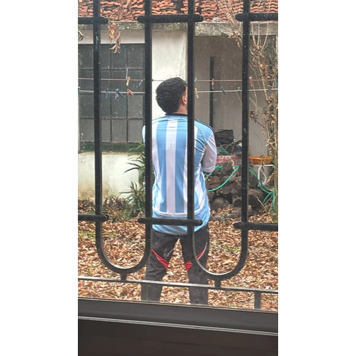 Figurinha: Torcedor com camisa da Argentina