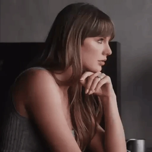 Figurinha: Taylor Swift e Gato
