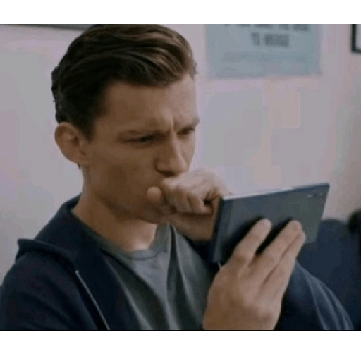 Figurinha: Tom Holland chocado