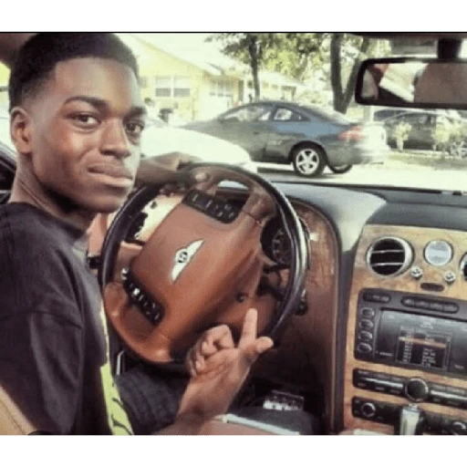 Figurinha: Kodak Black no carro