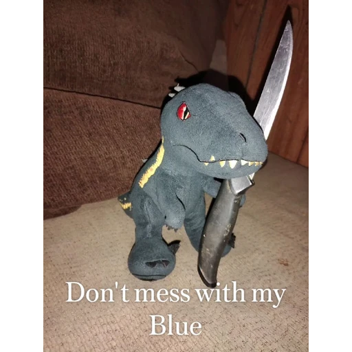 Figurinha: Dinossauro ameaçador com faca