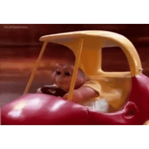 Figurinha: Baby Sinclair dirigindo