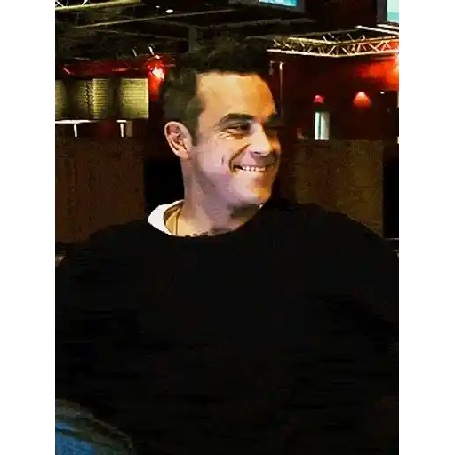 Figurinha: Robbie Williams rindo